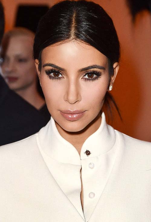 stylish ways to wear center part hairstyles Kim Kardashian121